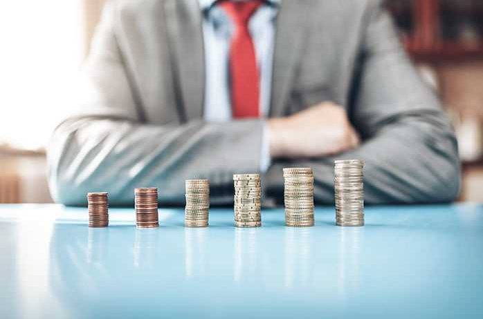 businessman-and-his-financial-investment-XNKD8TZ